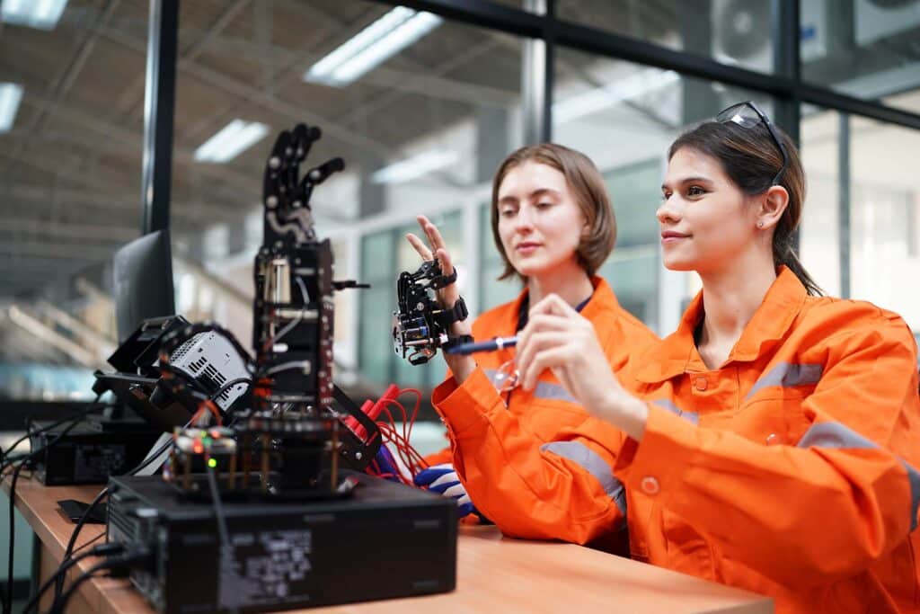 industry-4-0-young-engineer-works-at-a-robotic-ar-YWX4WUW.jpg